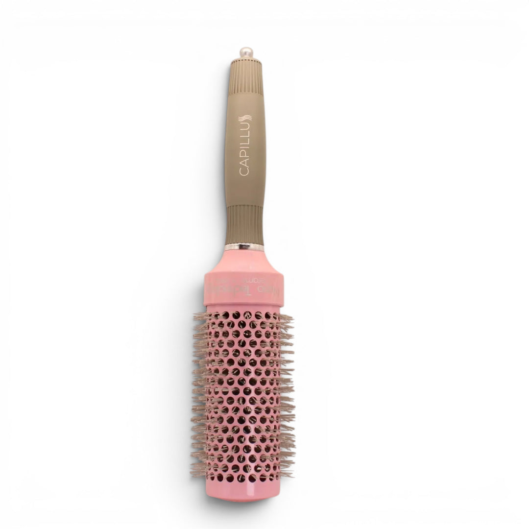 cepillo anti frizz, ideal para alisar cabellos sin maltratarlos dejando un brillo espectacular.