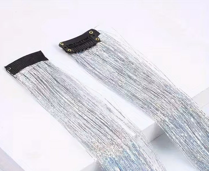 Extension de oropel con clip (unidad)