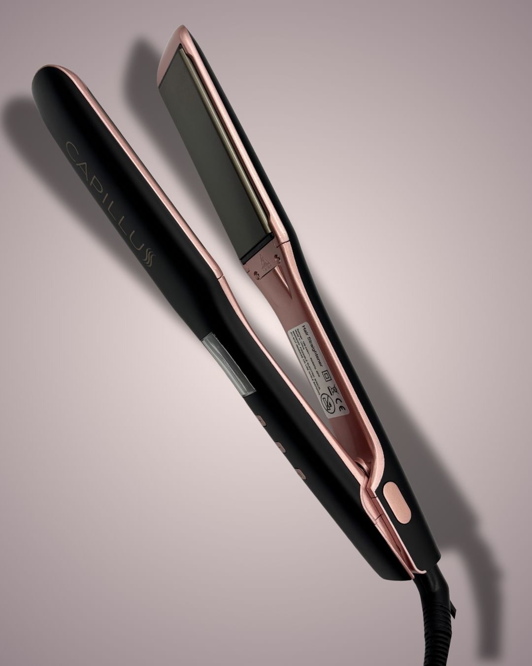 CAPILLUS Plancha de cerámica y nano titanio con placas flotantes.