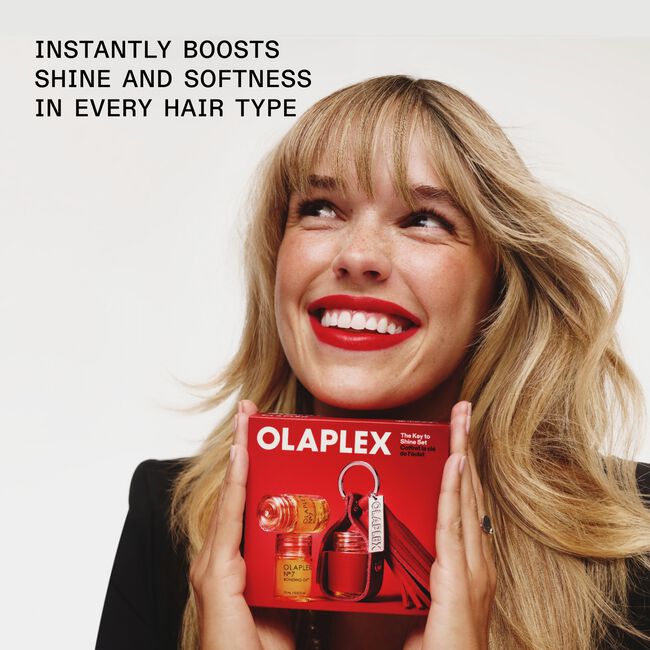 OLAPLEX The Key To Shine Holiday Set con tres mini Nº.7 Bonding Oil y llavero porta aceite rojo de edición limitada